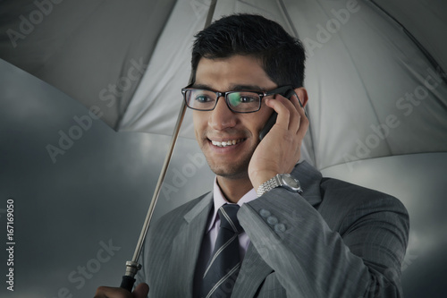 Businessman talking on mobile phone