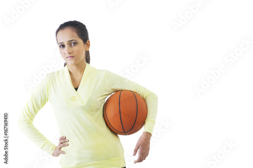 Portrait of a girl with a basketball 