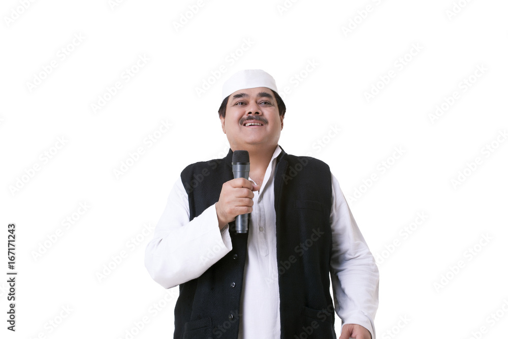 Smiling male politician with microphone Smiling male politician with microphone