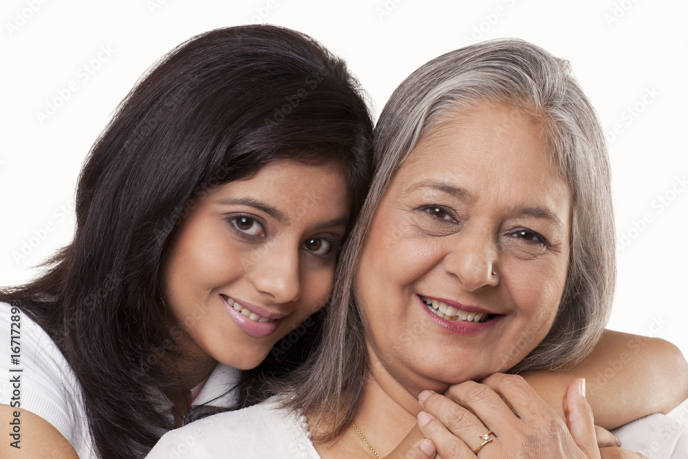 Portrait of a cute girl and her grandmother smiling Portrait of a cute girl and her grandmother smiling