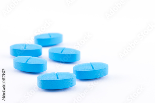 blue tablets of medicine