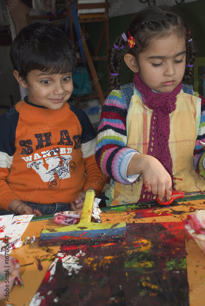 Fototapeta premium Little children painting