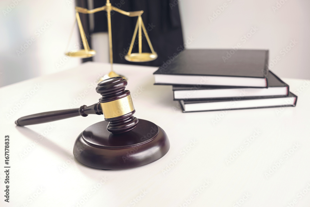 Attorney's suit, Law books, a gavel and scales of justice on a wooden white desktop, Lawyer and justice concept, law, legal advice Attorney's suit, Law books, a gavel and scales of justice on a wooden white desktop, Lawyer and justice concept, law, legal advice