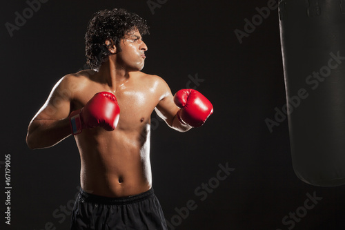 Young male boxer training  © IndiaPix