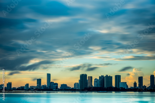 Long exposure on the city skyline in the morning. © ChyeSeng