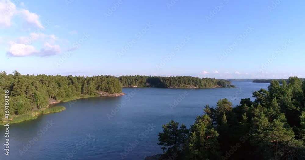Finnish islands, Cinema 4k aerial rising view above uusimaa saaristo archipelago, on the gulf of finland, on a sunny evening dawn, in the Baltic sea, in Raasepori, Finland Finnish islands, Cinema 4k aerial rising view above uusimaa saaristo archipelago, on the gulf of finland, on a sunny evening dawn, in the Baltic sea, in Raasepori, Finland