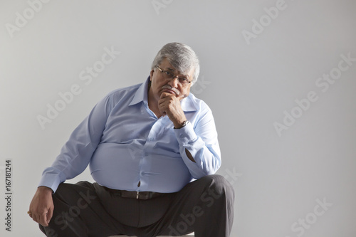 Portrait of an obese old man