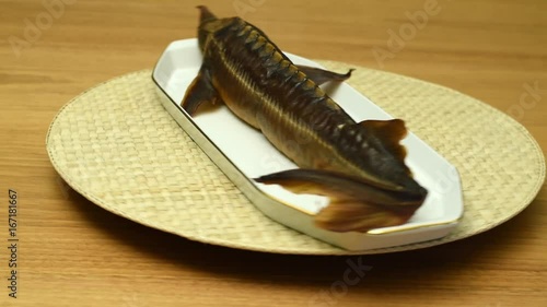 
Fish on a dish/Smoked sturgeon on a fish dish
