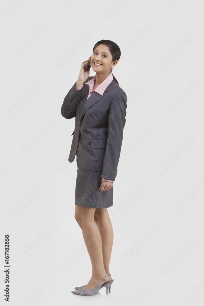 Portrait of businesswoman talking on a mobile phone Portrait of businesswoman talking on a mobile phone
