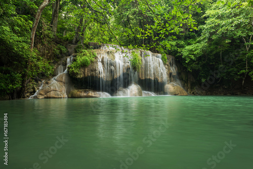 Fototapeta Naklejka Na Ścianę i Meble -  Scenery green waterfall at deep forest, Erawan waterfall located Kanchanaburi Province, Thailand