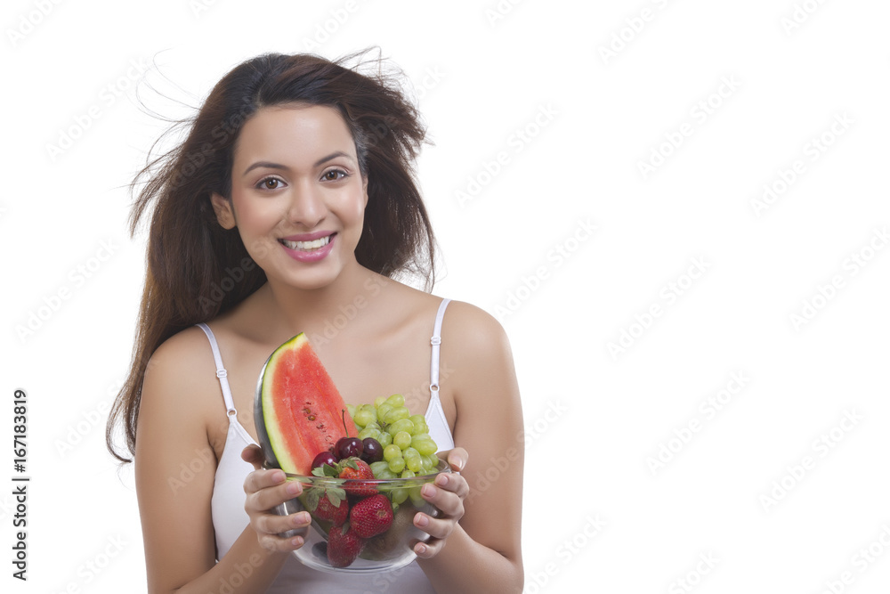 Portrait of woman with bowl of fruits Portrait of woman with bowl of fruits
