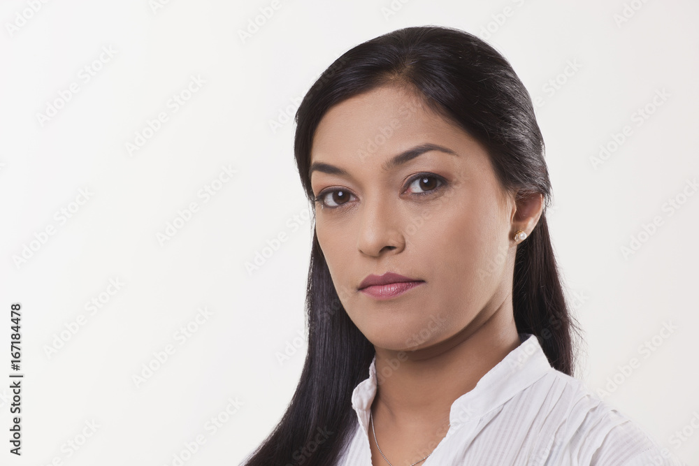 Portrait of a beautiful woman over white background Portrait of a beautiful woman over white background