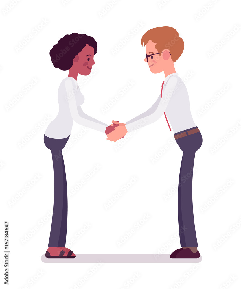 Fototapeta premium Male and female clerks handshaking with both hands