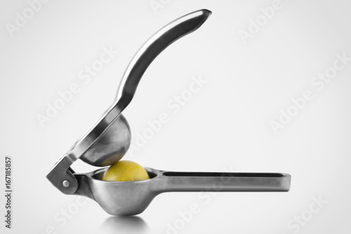 Close-up of lemon in juicer 