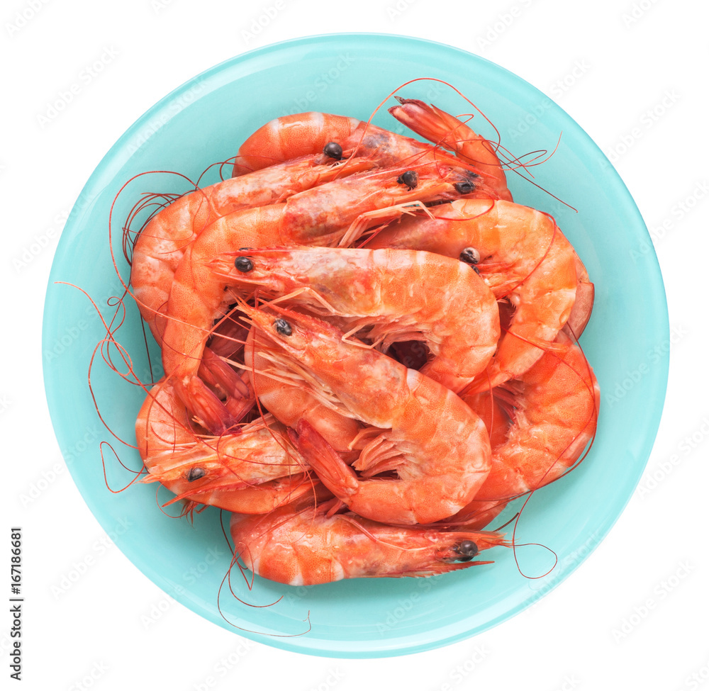 Fresh cooked shrimp on a plate isolated on white background. Fresh cooked shrimp on a plate isolated on white background.