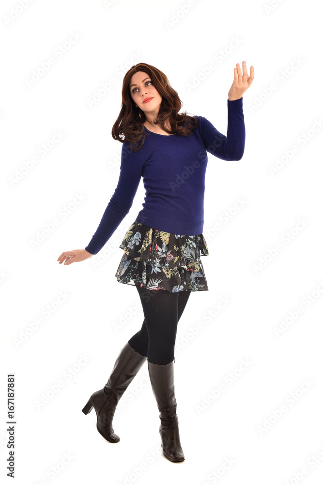 full length portrait of brunette woman wearing modern casual clothes. standing pose, isolated on white background full length portrait of brunette woman wearing modern casual clothes. standing pose, isolated on white background