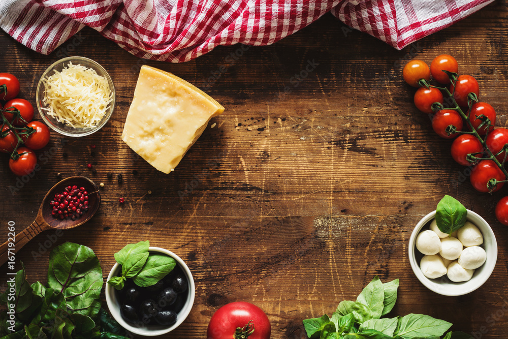 Italian cuisine / italian food ingredients on rustic wooden table with copy space. Top view