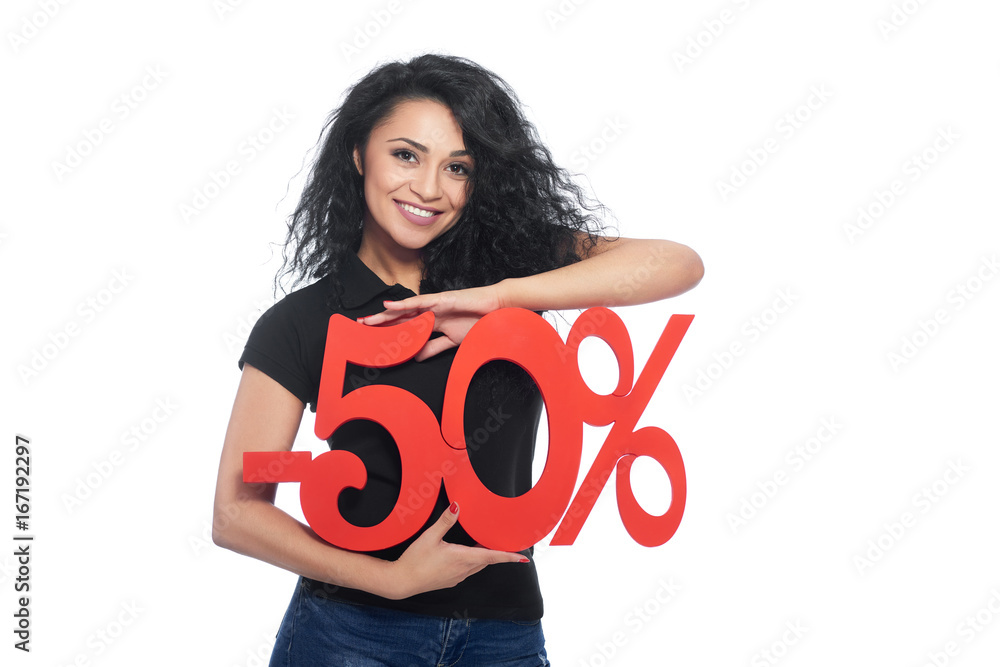 Studio shot of a beautiful happy Hispanic woman smiling joyfully holding -50 sale sign isolated on white discount seller offer sales pricing price consumerism shopping concept. Studio shot of a beautiful happy Hispanic woman smiling joyfully holding -50 sale sign isolated on white discount seller offer sales pricing price consumerism shopping concept.