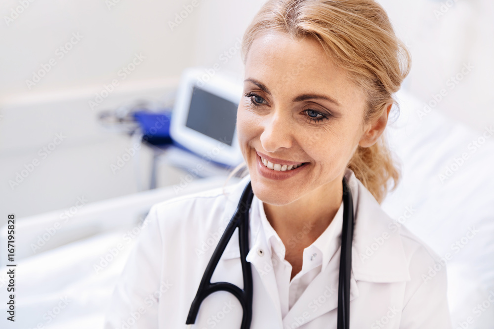 Sweet dedicated doctor enjoying her job Sweet dedicated doctor enjoying her job