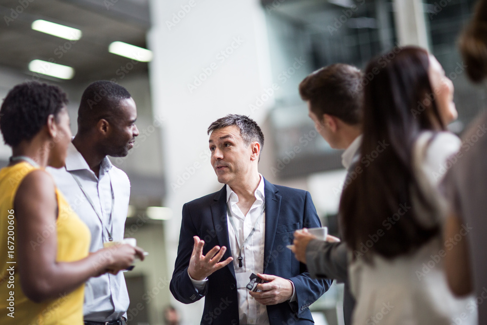 Business executives meeting at a networking event Business executives meeting at a networking event