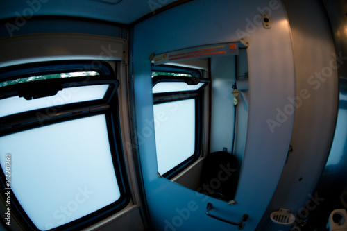 The window in the toilet of the railway car