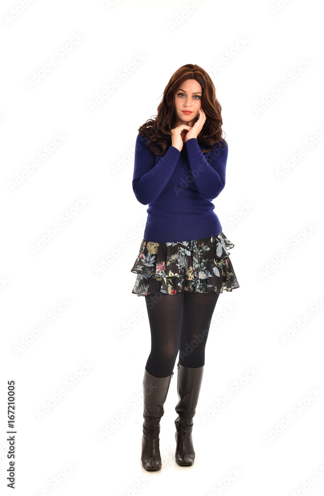 Full length portrait of a brunette girl wearing casual modern clothes. standing pose, isolated against white background Full length portrait of a brunette girl wearing casual modern clothes. standing pose, isolated against white background