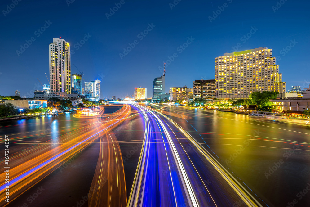 cityscape at night chao phraya river of bangkok city landscape Thailand , long exposure light