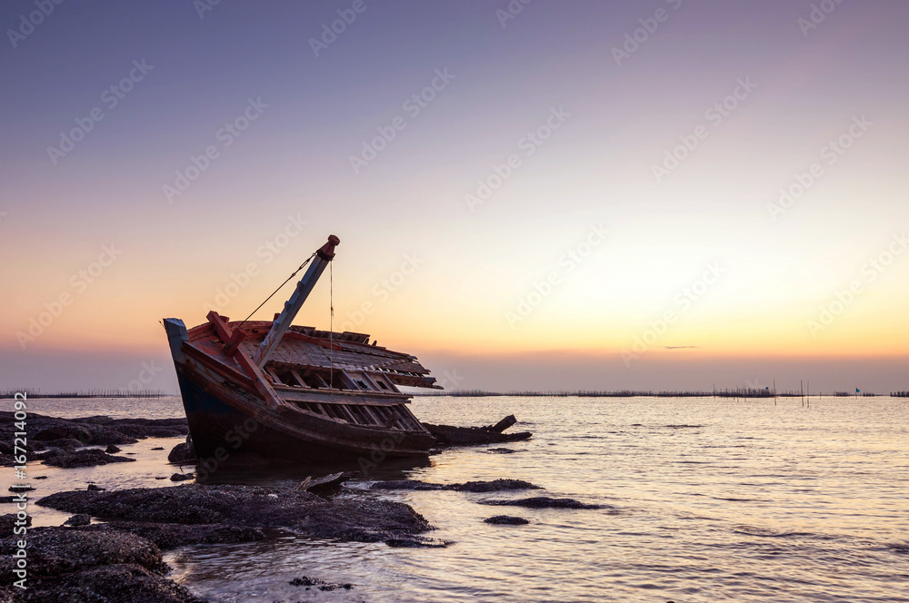 beautiful sunset  ,boat crashes in the sea , landscape  Thailand