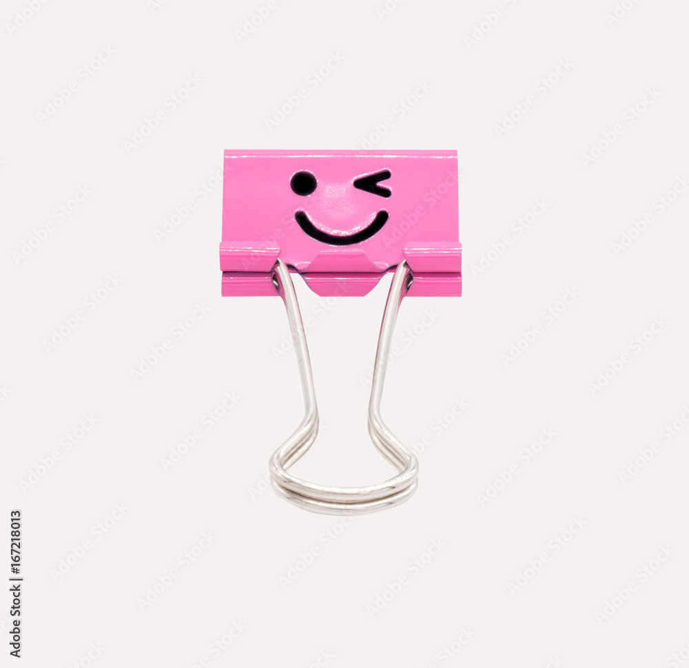 Obraz premium Cute smile pink binder clip isolated on white background with clipping path
