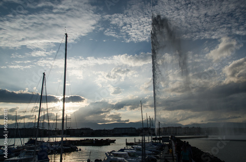 Jet d'Eau -  large fountain in Geneva, on sunset time. Switzerland
