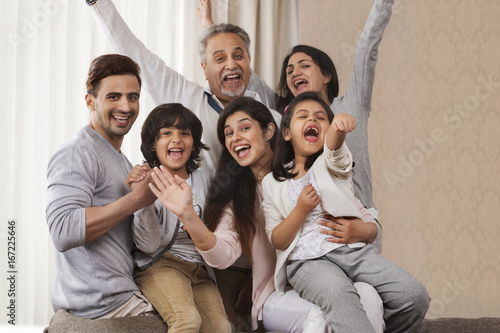 Cheerful multi-generation family sitting together © IndiaPix