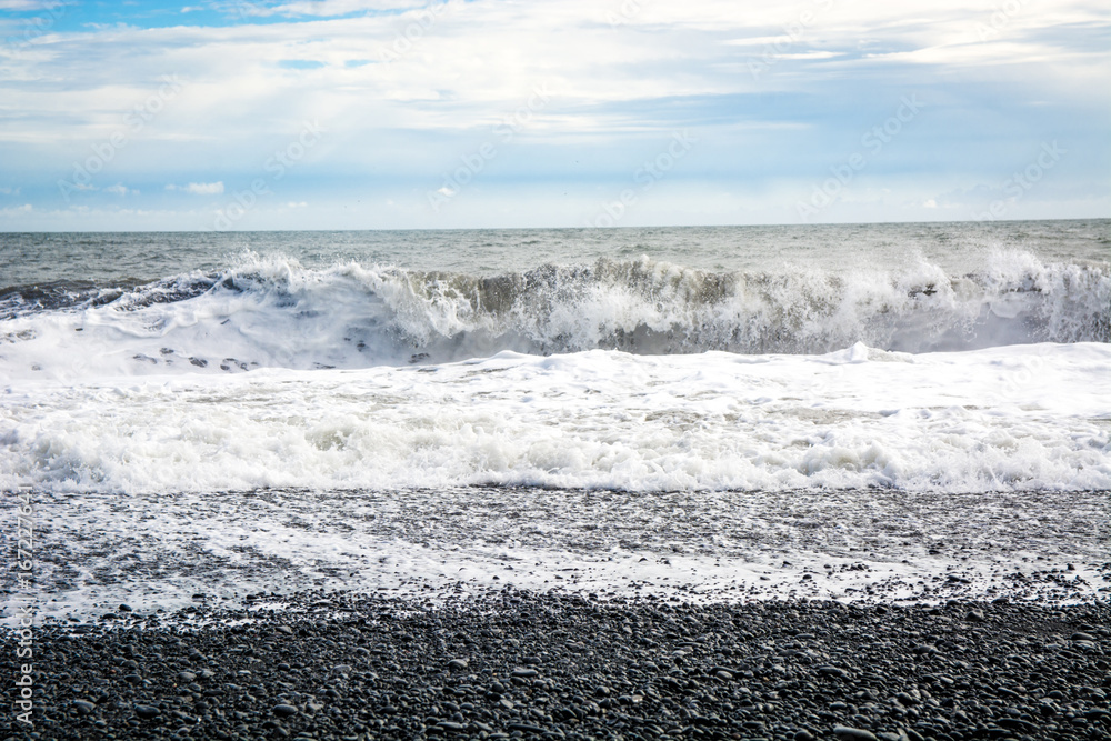 Fototapeta premium Black sand beach, Reynisfjara shore near the village Vik, atlantic ocean, Iceland