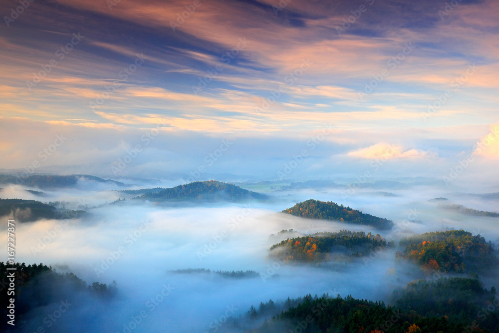  Czech typical autumn landscape. Hills and villages with foggy morning. Morning fall valley of Bohemian Switzerland park. Hills with fog, landscape of Czech Republic, landscape from Ceske Svycarsko.