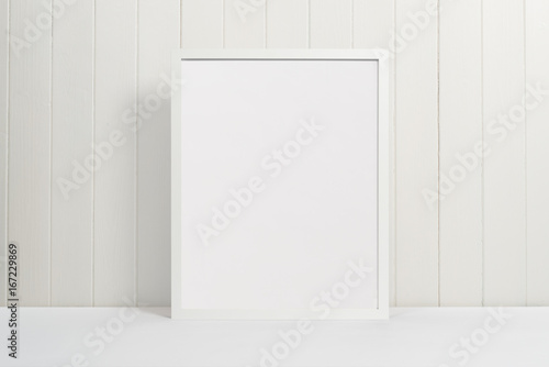 Fototapeta Naklejka Na Ścianę i Meble -  White picture frame on white background 