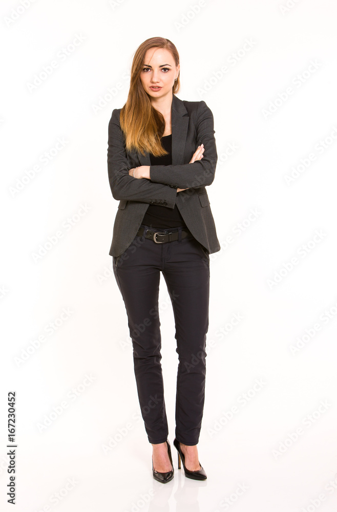 Dark blonde woman wearing smart casual outfit with cross hands on white background Dark blonde woman wearing smart casual outfit with cross hands on white background