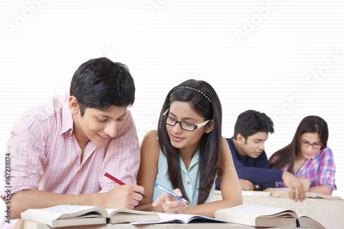 Young university students studying in classroom © IndiaPix