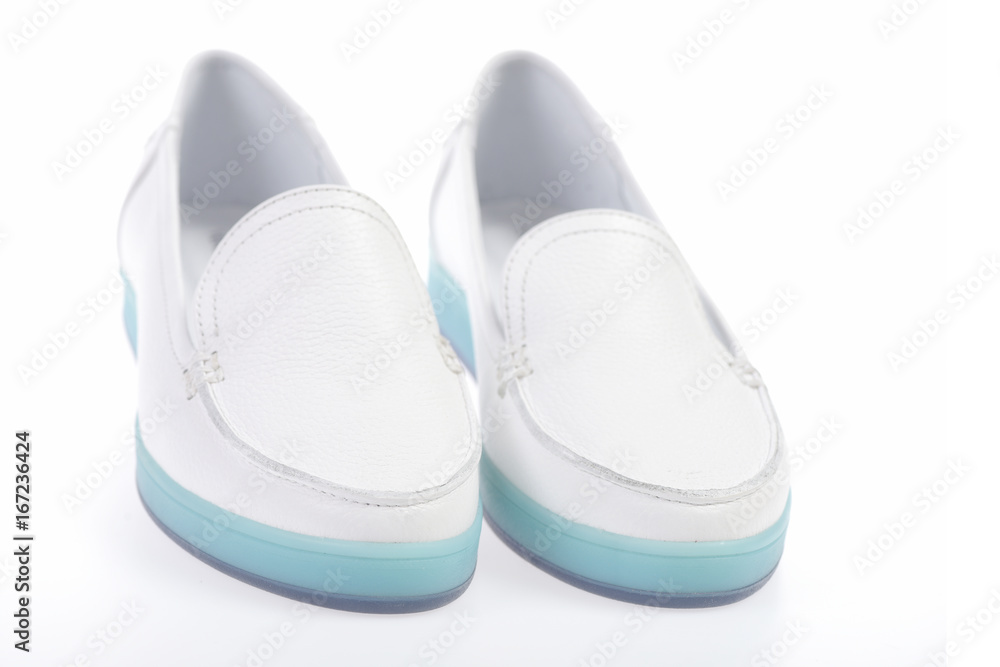 Pair of female leather moccasins in white color Pair of female leather moccasins in white color