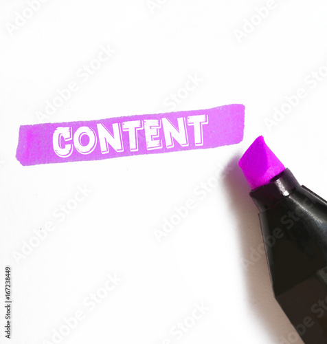 Content - single word highlighted on paper photo
