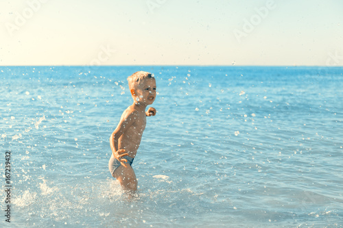 the summer boy in the sea