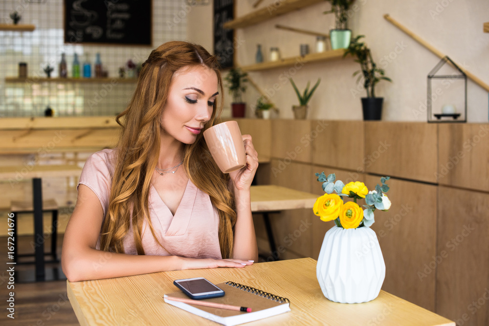 beautiful young blonde woman drinking coffee in cafe beautiful young blonde woman drinking coffee in cafe