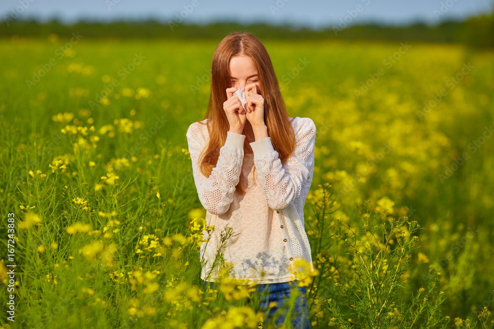 Pollen allergy, girl sneezing Pollen allergy, girl sneezing