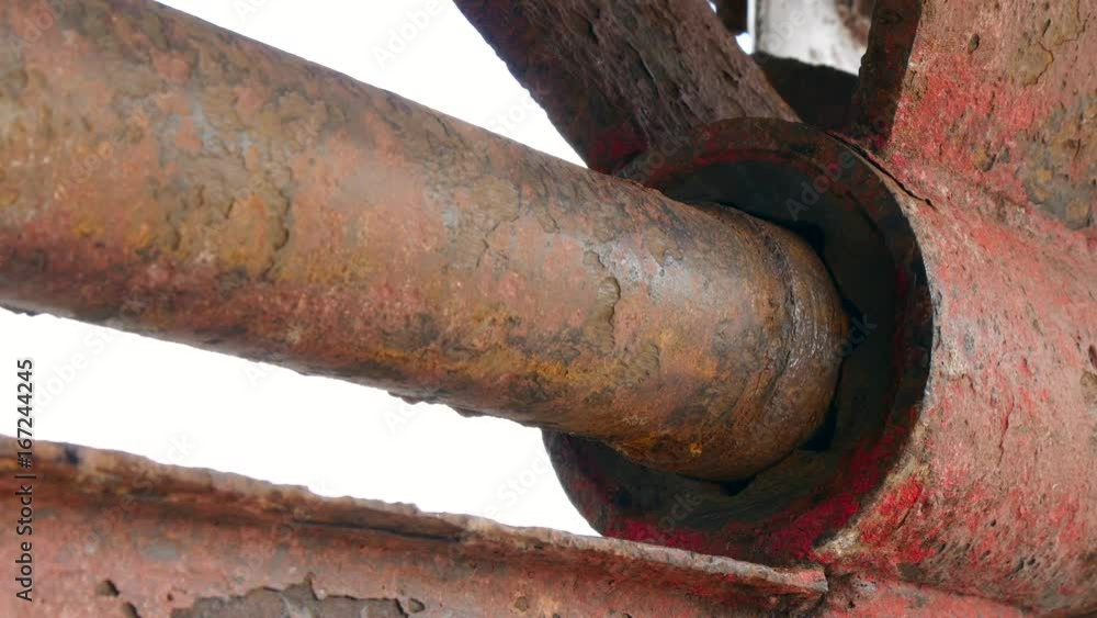 Lower part of ship rusty metal at shipyard in port of Moscow. Process of repair and reconstruction of sea vessel. Outdoor work. Technology of manual painting boats. Industry of water transport. Lower part of ship rusty metal at shipyard in port of Moscow. Process of repair and reconstruction of sea vessel. Outdoor work. Technology of manual painting boats. Industry of water transport.