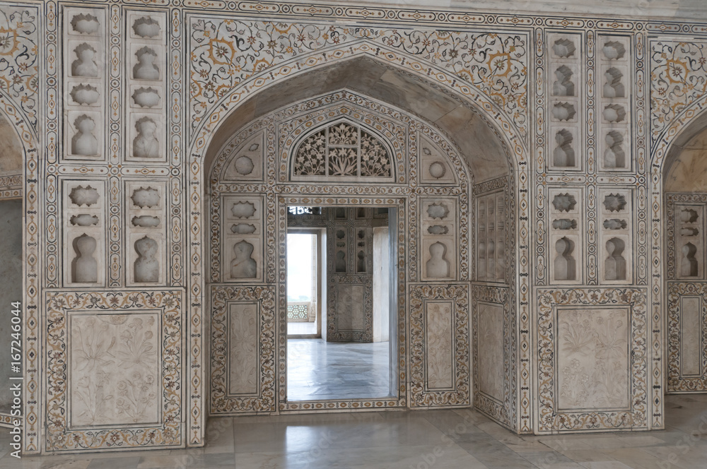 India: Agra Red Fort, a Unesco World Heritage site. Decorated marble walls and doors.