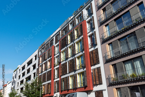 Row of modern apartment buildings seen in Berlin, Germany © elxeneize