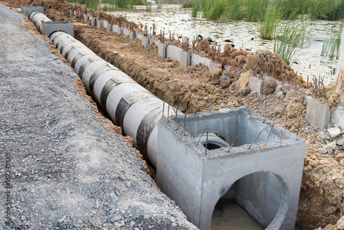 Concrete drainage pipe and manhole.