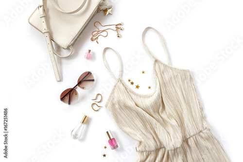 Woman background - golden styled clothes and accessories collage on white background. flat lay, top view