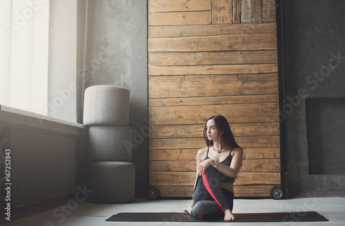 Young attractive woman practicing yoga
