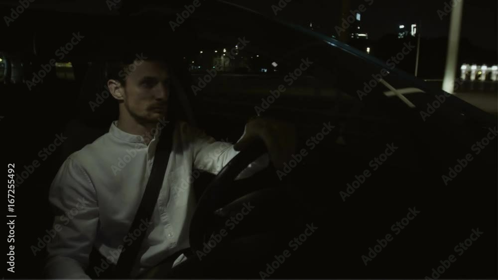 Businessman Turning his Face Right While Driving Straight Businessman Turning his Face Right While Driving Straight