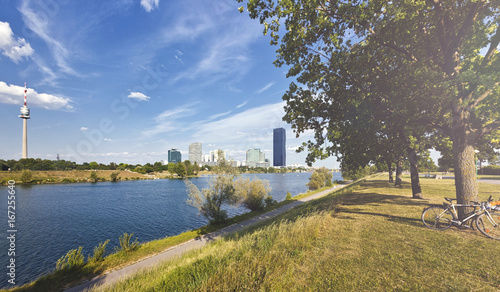 Canvas Print At the Danube Island with the Danube City Vienna, the new DC Tower and the Danub