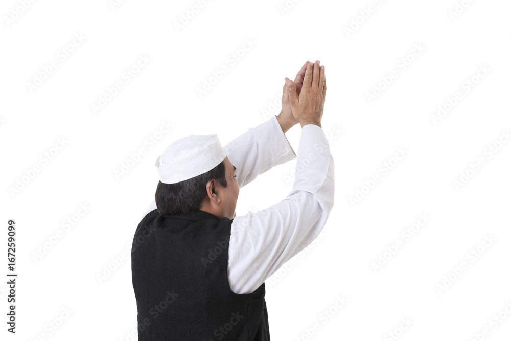 Back view of politician with clasped hands Back view of politician with clasped hands